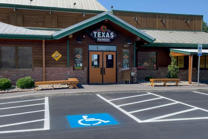 A Texas Roadhouse parking lot, paved by JD Asphalt