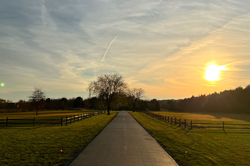 A long residential driveway paved by JD Asphalt