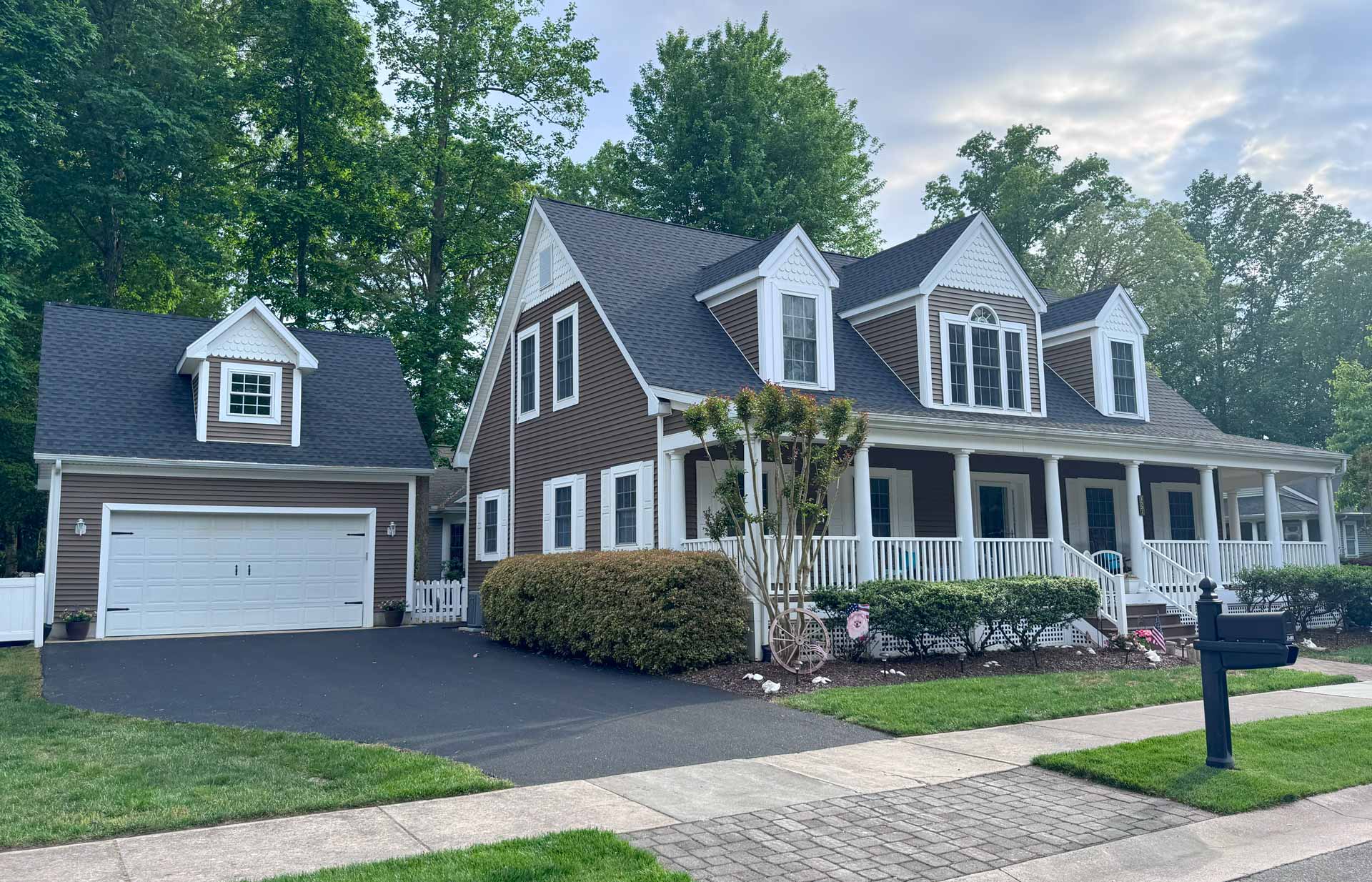 Home with a newly paved driveway